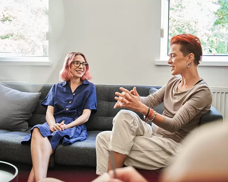 Lesbian couple in a therapy session with Dr. Daria Chase